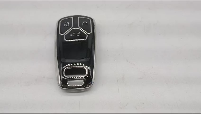 
                  
                    Load and play video in Gallery viewer, KMH TPU Silver Car Key Cover Compatible with Audi A4 TT TTS Q7 2016 2017 Key Cover
                  
                